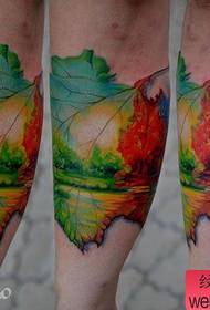 Cool leaves and landscape tattoos on the legs