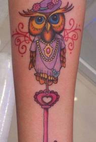 arm cute little owl with key tattoo pattern