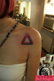 girls Small and trivial triangular tattoo pattern on the shoulder
