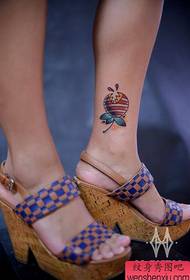 small lollipop cannibal flower tattoo pattern at the girl's ankle  169558 - a small radish tattoo pattern on the wrist