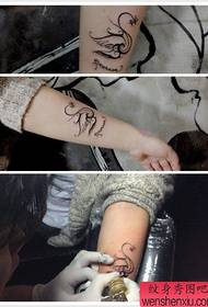 popular girl arm swan tattoo pattern
