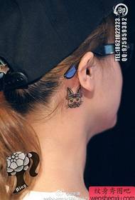 girl's ear small bunny tattoo pattern