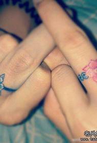 finger couple small flower ring tattoo pattern