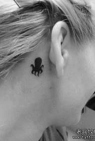 girl ear a totem small octopus tattoo pattern
