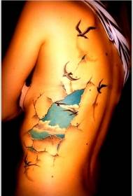 side ribs creative skin rupture sky landscape with bird tattoo pattern