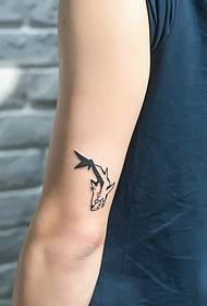 an inconspicuous small animal tattoo picture outside the arm