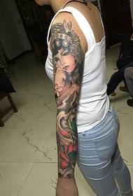 sling kyau hannun gargajiya flower denim tattoo hoto