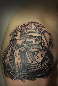 skull old K man big arm tattoo