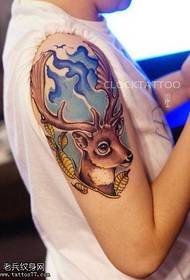 arm splash ink colored antelope tattoo pattern