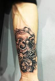 skull叼花个人臂tattoo image