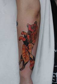 arm leaves set up into a fox tattoo picture very personality