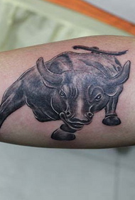 arm on the cow tattoo
