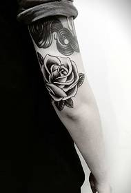 men's arm black and white rose tattoo picture is very charming
