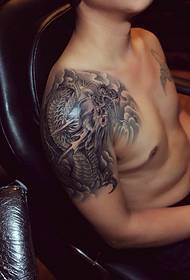 Big black and white evil dragon tattoo picture is quite handsome