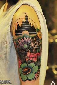 arm flower peak tower tattoo pattern