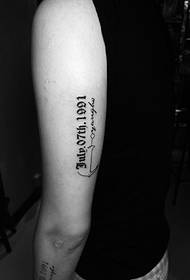 Tattoo pattern with English words and numbers on the outside of the arm