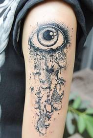 Tears of the fish personality arm tattoo
