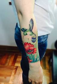 flowers in the small swallows and flowers arm tattoo pictures