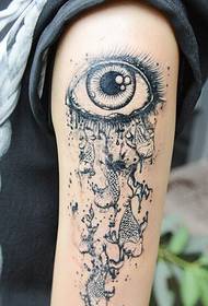 arm black gray eye fish tattoo