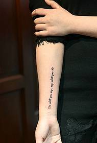 small fresh and delicate wrist English tattoo picture
